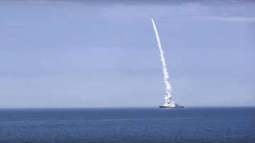 A Russian warship launches a cruise missile at a target in Ukraine.