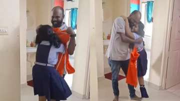Father surprises daughter with his new job