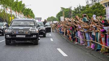 Prime Minister Narendra Modi's convoy being welcomed by locals during his visit to Vadodara. 