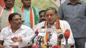 Congress leader Shashi Tharoor (Right)