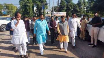 MP minister walks barefoot, issues apology to the people for the poor condition of the roads.