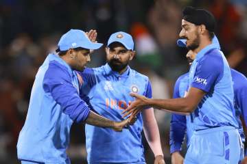 Arshdeep Singh celebrating a wicket with his teammates.