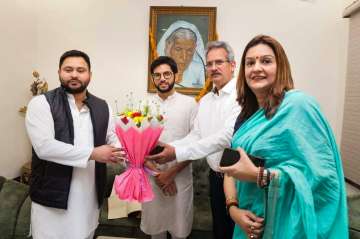 Shiv Sena (Uddhav Thackeray) leader Aditya Thackeray and party MP Priyanka Chaturvedi being greeted by Bihar Deputy CM Tejashwi Yadav during a meeting, in Patna