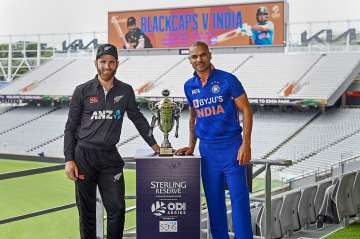 Kane Williamson and Shikhar Dhawan pose with the ODI series trophy on the eve of the 1st match at Ed