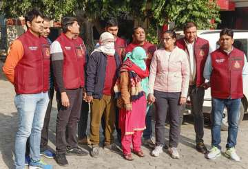 New Delhi: Poonam and her son Deepak, accused in the murder of the formers husband Anjan Das, following their arrest by police, in New Delhi, Monday, Nov. 28, 2022. 