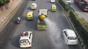  An anti-smog gun being used to spray water droplets to curb air pollution, in New Delhi.