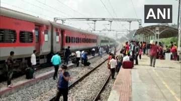 Local police rushed to rescue passengers after a fire broke out in a bogie of the Bangalore - Howrah express train.