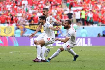 Iran celebrates their 1st goal vs Wales