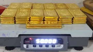 Fourteen kilograms of gold were seized from two people while a third was held with 13 kg and a fourth was found carrying 12 kg of the material. The accused people were flying from Doha, Qatar. 