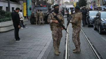 Istanbul blast: Security and ambulances at the scene after an explosion on Istanbul's popular pedestrian Istiklal Avenue