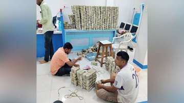 It said cash worth more than Rs 2 crore has been seized