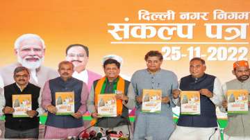 Union Minister Piyush Goyal, Delhi BJP President Adesh Gupta, party leader Baijayant Jay Panda, LOP Ramvir Singh Bidhuri and others during release of BJP party manifesto.