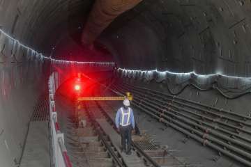 A worker inside the tunnel of the Delhi-Ghaziabad-Meerut RRTS corridor, in New Delhi.