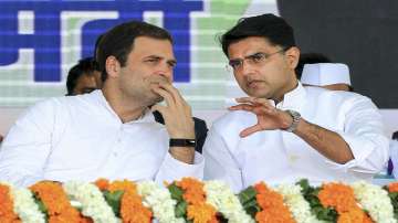 Congress leader Sachin Pilot (R) is seen with Congress President Rahul Gandhi during a rally in Jaipur