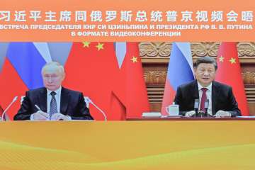 Russian President Vladimir Putin and Chinese President Xi Jinping during a virtual meeting.