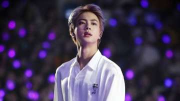 BTS Jin leaves for military service photos