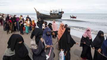 Myanmar vessel rescues 154 Rohingya refugees from sinking boat off country's coast