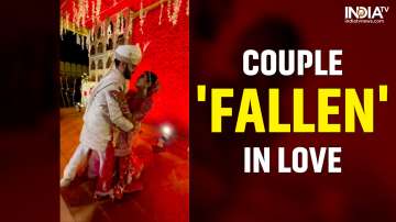 Bride-groom’s romantic dance goes wrong as they fall