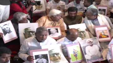 Karnataka Congress leaders stage protest outside the assembly.