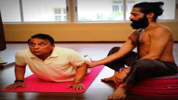 Yoga Guru Sidhaa Akshar with cricket legend Sunil Gavakar