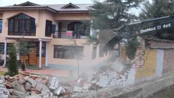 Jammu and Kashmir Administration demolishes property of Hizbul Mujahideen terrorist commander Amir Khan, in Anantnag's Pahalgam.
