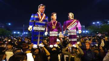 Supporters of ousted Peruvian President Pedro Castillo hold puppets depicting President of Congress Jose Williams, from left, Attorney General Patricia Benavides and Peru's new President Dina Boluarte, during a protest in Lima, Peru.