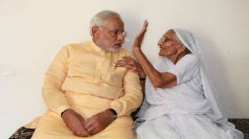 Prime Minister Narendra Modi with her mother, Heeraba Modi.
