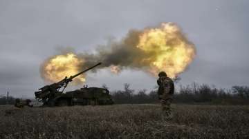 Ukrainian soldiers fire a French-made CAESAR self-propelled howitzer towards Russian positions near Avdiivka.