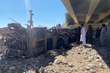 People gather after a powerful blast