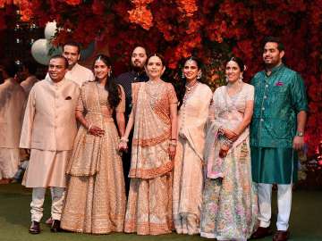 Mukesh Ambani along with his family members at a function.