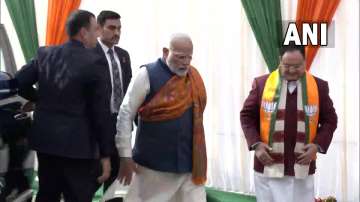 PM Modi arrives at NDMC Convention Centre. 