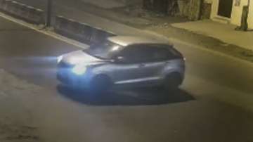 Video grab of a car that reportedly hit a woman and dragged her for a few kilometers, in the Sultanpuri area of Delhi, Sunday, Jan. 1, 2023.