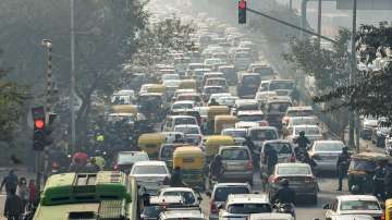 Vehicles stuck in a traffic jam near Pragati Maidan due to full dress rehearsal of the Republic Day Parade 2023, in New Delhi