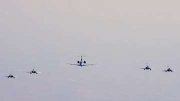A AEW&C - Netra in the center flanked by four Rafale multi-role fighters in 'Netra' formation at Republic Day flypast