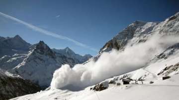 Tibet: Avalanche trapped vehicles outside highway tunnel near Nyingchi