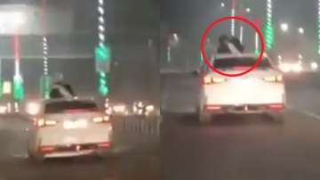 After scooty, lovers romance atop car in viral video