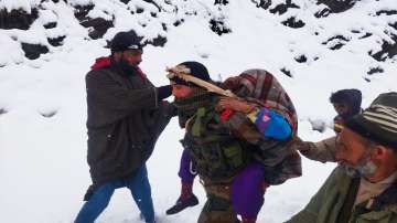 J&K: Army evacuates 80-year-old woman with severe fever and arthritis amid heavy snowfall 
