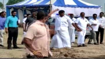Tamil Nadu Minister SM Nasar throws a stone at DMK worker in Tiruvallur