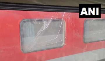Cracks in the Vande Bharat train after pelting of stones.