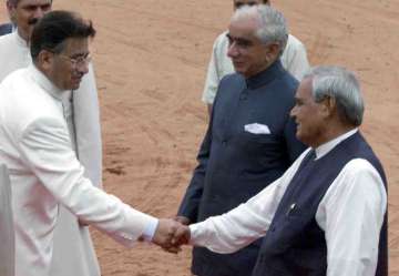 Pakistan's former military ruler General Pervez Musharraf while shaking hands with the then Indian PM Atal Bihari Vajpayee