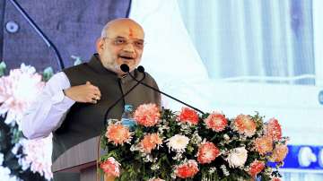 Union Home Minister Amit Shah addresses the New Education Societys centenary celebration and souvenir release function, in Kolhapur.