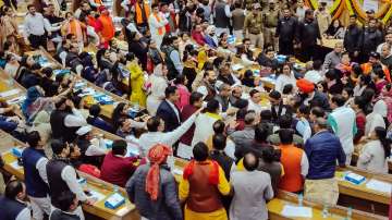 AAP and BJP members exchange heated arguments during the election of Mayor and Deputy Mayor at the Civic Centre, in New Delhi.