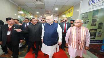 Union Home Minister Amit Shah with Haryana CM Manohar Lal Khattar during an event on Tuesday.