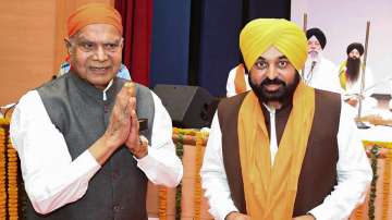 Punjab Governor Banwarilal Purohit with Chief Minister Bhagwant Mann