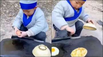 Toddler makes egg sandwich like a pro chef