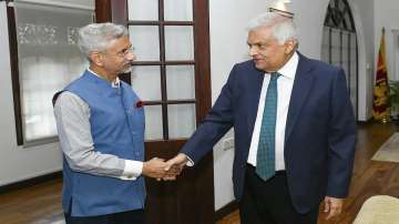 President Ranil Wickremesinghe, right, shake hands with India’s Foreign Minister S. Jaishankar in Colombo.