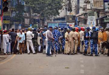 Howrah: Security personnel cordon off an area after clashes broke out between two groups 