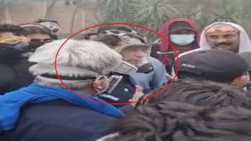 Pakistan: Imran Khan spotted in gas mask as police reach outside his house to arrest in Toshakhana case