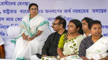 West Bengal Chief Minister and TMC supremo Mamata Banerjee with party leaders during a two-day sit-in demonstration against Centre's alleged discriminatory attitude against the state, in Kolkata.