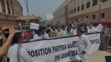 Opposition leaders take out a protest march from Parliament to ED office over Adani issue